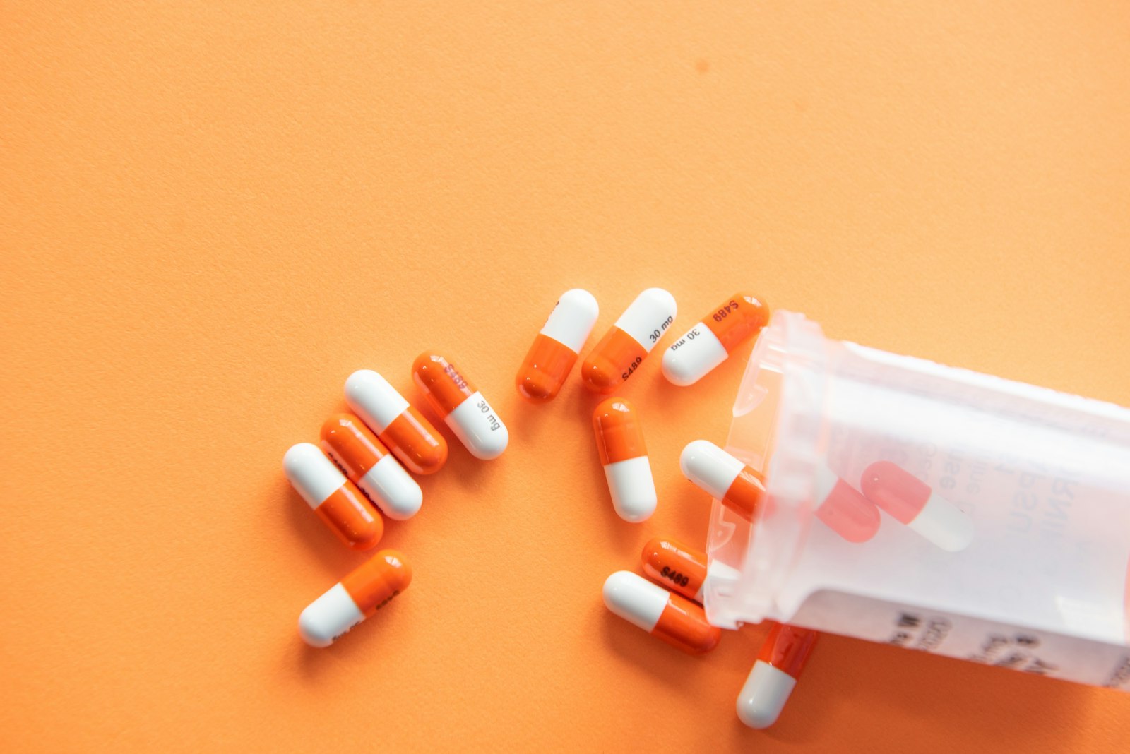 Blister-pack production line under soft factory light — pharma.