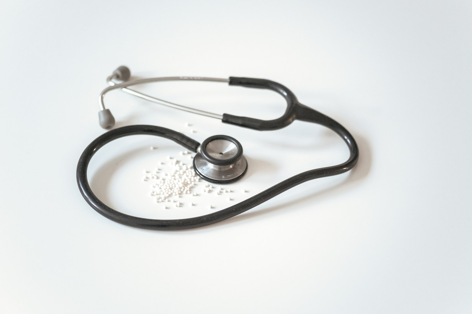 Clinician reviewing patient data on a modern healthtech tablet interface.